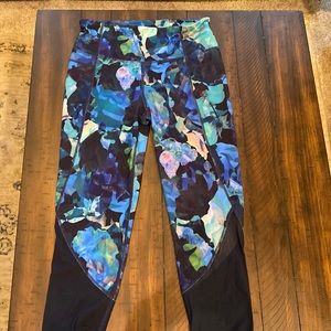 Athleta leaf multi colored tights in size medium.